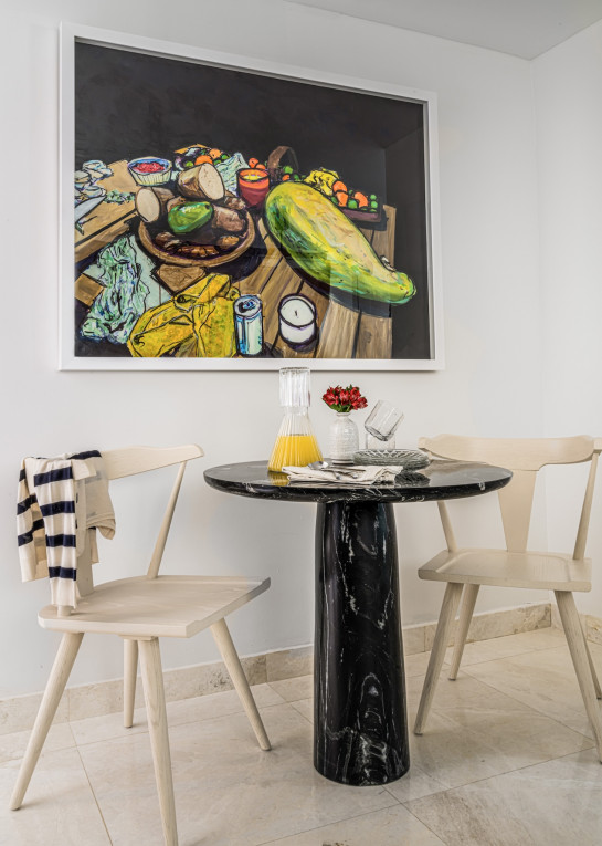 small-dining-table-with-art-over-table